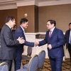 Thủ tướng Phạm Minh Chính làm việc với một số doanh nghiệp Việt kiều tại Hoa Kỳ trong lĩnh vực tài chính và công nghệ. (Ảnh: Dương Giang/TTXVN)