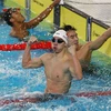 Niềm vui của vận động viên Nguyễn Huy Hoàng (Việt Nam) tiếp tục giành huy chương Vàng nội dung 200m bơi bướm nam với thành tích 1 phút 58 giây 81. (Ảnh: Phạm Kiên/TTXVN)