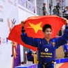Vận động viên đội tuyển Vovinam Việt Nam Nguyễn Thanh Liêm giành huy chương Vàng ở nội dung đối kháng hạng cân 60kg nam. (Ảnh: Tuấn Anh/TTXVN)