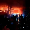 Nơi xảy ra vụ cháy kho xưởng tại địa bàn phường Lái Thiêu, thành phố Thuận An, Bình Dương. (Ảnh: TTXVN phát)