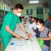 Công ty trách nhiệm hữu hạn SBGEAR Vina phối hợp cùng Liên đoàn Lao động huyện Hóc Môn tổ chức Ngày hội Sức khỏe cho người lao động. (Ảnh: Thanh Vũ/TTXVN)