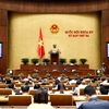 Quốc hội biểu quyết thông qua Nghị quyết về việc thành lập Đoàn giám sát chuyên đề của Quốc hội năm 2023. (Ảnh: Doãn Tấn/TTXVN)