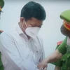 Nguyên Giám đốc CDC Bình Phước Nguyễn Văn Sáu bị khởi tố, bắt tạm giam. (Ảnh: TTXVN phát)