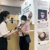 Doanh nghiệp trưng bày và giới thiệu thông tin truy xuất nguồn gốc sản phẩm tại Triển lãm quốc tế Café show 2022 tại Việt Nam. (Ảnh: Mỹ Phương/TTXVN)