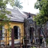 Hiện trường vụ cháy tại khu vực nhà ngang nằm trong khuôn viên Quốc Tử Giám ở Thừa Thiên-Huế. (Ảnh: Đỗ Trưởng/TTXVN)