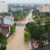 Một số tuyến phố chính bị ngập nước tại thành phố Vĩnh Yên. (Ảnh: Hoàng Hùng/TTXVN)