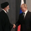 Tổng thống Nga Vladimir Putin (phải) và người đồng cấp Iran Ebrahim Raisi. (Nguồn: Reuters)