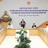 Thủ tướng Chính phủ Phạm Minh Chính chủ trì Hội nghị trực tuyến Thủ tướng Chính phủ với các Trưởng Cơ quan đại diện Việt Nam ở nước ngoài. (Ảnh: Dương Giang/TTXVN)