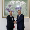 Chủ tịch nước Nguyễn Xuân Phúc hội kiến Chủ tịch Hạ viện Nhật Bản Hosoda Hiroyuki. (Ảnh: Thống Nhất/TTXVN)