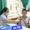 Tiêm vaccine phòng COVID-19 cho trẻ em. (Ảnh: Tuấn Anh/TTXVN)