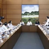 Các đại biểu Quốc hội tỉnh Hưng Yên, Ninh Bình, Kiên Giang và thành phố Cần Thơ thảo luận tại tổ. (Ảnh: An Đăng/TTXVN)