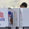 Cử tri bỏ phiếu bầu cử giữa kỳ Quốc hội Mỹ ở Kissimmee, Florida, ngày 8/11/2022. (Ảnh: AFP/TTXVN)