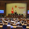 Quốc hội biểu quyết thông qua Nghị quyết về Kế hoạch phát triển kinh tế-xã hội năm 2023. (Ảnh: Văn Điệp/TTXVN)