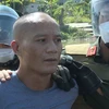 Đối tượng Trương Duy Giáp bị bắt khi đang thực hiện hành vi mua bán trái phép chất ma túy. (Ảnh: TTXVN phát)