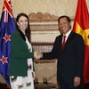 Chủ tịch Ủy ban Nhân dân Thành phố Hồ Chí Minh Phan Văn Mãi tiếp Thủ tướng New Zealand Jacinda Ardern. (Ảnh: Thanh Vũ/TTXVN)