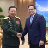 Thủ tướng Phạm Minh Chính tiếp Đại tướng Chansamone Chanyalath, Phó Thủ tướng, Bộ trưởng Bộ Quốc phòng Lào. (Ảnh: Dương Giang/TTXVN)