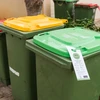 Thùng đựng rác thải hữu cơ trong vườn có màu xanh lá cây. (Nguồn: ABC News)