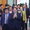 Thủ tướng Phạm Minh Chính dự Hội nghị tổng kết công tác năm 2022 và triển khai nhiệm vụ năm 2023 của Bộ Kế hoạch và Đầu tư. (Ảnh: Dương Giang/TTXVN)