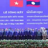 Thủ tướng Phạm Minh Chính và Thủ tướng Lào Sonexay Siphandone cùng các đại biểu tại Lễ tổng kết Năm Đoàn kết Hữu nghị Việt Nam-Lào, Lào-Việt Nam 2022. (Ảnh: Dương Giang/TTXVN)