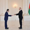 Đại sứ Việt Nam tại Liên bang Nga kiêm nhiệm Azerbaijan Đặng Minh Khôi trình Quốc thư lên Tổng thống Azerbaijan, Ilham Aliyev. (Ảnh: TTXVN phát)