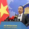 Phó phát ngôn Bộ Ngoại giao Đoàn Khắc Việt chủ trì họp báo thường kỳ tháng 2/2023. (Ảnh: Phạm Kiên/TTXVN)