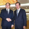 Thủ tướng Campuchia Samdech Techo Hun Sen và người đồng cấp Lào Sonexay Siphandone. (Nguồn: Pressocm)
