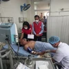 Các bệnh nhân trong vụ tai nạn thương tâm đang được tích cực điều trị tại Bệnh viên Đa khoa Trung ương Quảng Nam. (Ảnh: Trịnh Bang Nhiệm/TTXVN)