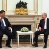 Tổng thống Nga Vladimir Putin (phải) trong cuộc gặp Chủ tịch Trung Quốc Tập Cận Bình tại thủ đô Moskva, ngày 20/3/2023. (Ảnh: AFP/TTXVN)