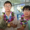 Ngô Quý Đăng (bên phải) giành huy chương Vàng Olympic Toán học quốc tế 2022 với số điểm tuyệt đối 42/42. (Ảnh: TTXVN phát)