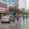 Mưa to gây ngập cục bộ trên đường Cách Mạng Tháng Tám, quận Ninh Kiều, thành phố Cần Thơ. (Ảnh: TTXVN phát)