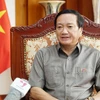 Đại sứ Việt Nam tại Lào Nguyễn Bá Hùng trả lời phỏng vấn phóng viên TTXVN tại Lào. (Ảnh: Đỗ Bá Thành/TTXVN)