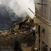 Hiện trường vụ sập tòa nhà ở quận La Plaine, thành phố cảng Marseille của Pháp. (Ảnh: AFP/TTXVN)