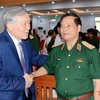 Ông Nguyễn Hòa Bình, Chánh án Tòa án Nhân dân Tối cao và Thượng tướng Võ Tiến Trung, nguyên Giám đốc Học viện Quốc phòng. (Nguồn: Quân đội nhân dân)