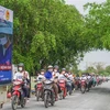 Ra quân tuyên truyền phòng, chống bệnh dại trên các tuyến đường huyện Đức Huệ, tỉnh Long An. (Ảnh: Thanh Bình/TTXVN)