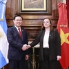 Chủ tịch Quốc hội Vương Đình Huệ và Chủ tịch Hạ viện Cộng hòa Argentina Cecilia Moreau. (Ảnh: Doãn Tấn/TTXVN)