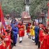 Các nghi lễ truyền thống trong Lễ hội Hoa Lư thu hút đông đảo nhân dân và du khách đến tham quan, chiêm bái. (Ảnh: Hải Yến/TTXVN)