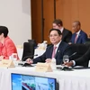 Thủ tướng Phạm Minh Chính tham dự Phiên thảo luận 'Đối tác về cơ sở hạ tầng và đầu tư toàn cầu của G.' (Ảnh: Dương Giang/TTXVN)