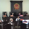 Hội đồng xét xử phiên tòa trực tuyến vụ án Vũ Thị Kim Anh vận chuyển trái phép chất ma túy. (Ảnh: Tuấn Kiệt/TTXVN)