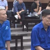 Cựu Tổng Giám đốc Cienco 1 Cấn Hồng Lai (phải) và cựu Chủ tịch Hội đồng thành viên Cienco1 Phạm Dũng. (Ảnh: TTXVN phát)