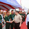 Thủ tướng Phạm Minh Chính đến dự Lễ khởi công tuyến đường bộ cao tốc Sóc Trăng-Cần Thơ-Châu Đốc. (Ảnh: Dương Giang/TTXVN)