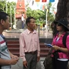 Nhà báo Hồng Thanh tác nghiệp tại Đảo Sinh Tồn. (Ảnh: Nhân vật cung cấp)