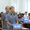 Bị cáo Nguyễn Văn Sơn, cựu Tư lệnh Bộ Tư lệnh Cảnh sát Biển Việt Nam trả lời phần xét hỏi căn cước tại phiên tòa. (Ảnh: An Đăng/TTXVN)