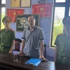 Lực lượng chức năng khởi tố, bắt tạm giam Nguyễn Thanh Long, Phó Giám đốc phụ trách Trung tâm Đăng kiểm Xe cơ giới 73-01S. (Ảnh: TTXVN phát)