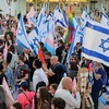 Biểu tình phản đối kế hoạch cải cách tư pháp của Chính phủ Israel. (Ảnh: AFP/TTXVN)