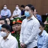 Bị cáo Phạm Trung Kiên, cựu Thư ký Thứ trưởng Bộ Y tế khai báo trước tòa. (Ảnh: Phạm Kiên/TTXVN)