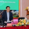 Phó Thủ tướng Chính phủ Trần Lưu Quang chủ trì Hội nghị. (Ảnh: Thanh Hải/TTXVN)