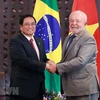 Thủ tướng Phạm Minh Chính và Tổng thống Brazil Luiz Inácio Lula da Silva chiều 21/5/2013. (Ảnh: Dương Giang/TTXVN)