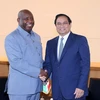 Thủ tướng Phạm Minh Chính gặp Tổng thống Burundi Evariste Ndayishimiye. (Ảnh: Dương Giang/TTXVN)