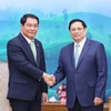 Thủ tướng Phạm Minh Chính tiếp Đô trưởng Vientiane (Lào) Atsaphangthong Siphandone. (Ảnh: Dương Giang/TTXVN)