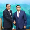 Thủ tướng Phạm Minh Chính tiếp Trưởng Ban Đối ngoại Trung ương Đảng Nhân dân Campuchia Prak Sokhonn. (Ảnh: Dương Giang/TTXVN)